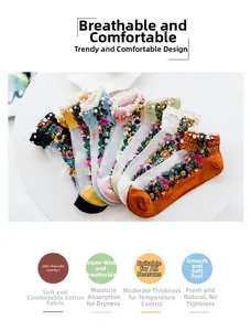 Detailed embroidery on mesh socks with lace trim and elegant pearl embellishments