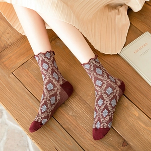 Retro Japanese-style mid-calf cotton socks with blue damascus pattern and ruffled edges