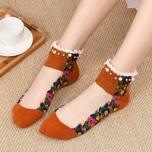 Lace mesh socks with floral embroidery, pearl embellishments and orange knit details