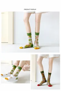 Detail of sheer floral mesh socks with vintage flower patterns and contrasting toe colors