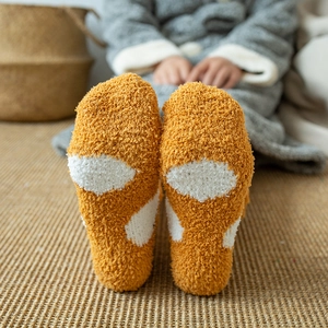 Thick yellow coral fleece socks with white spots and cute animal paw design for women