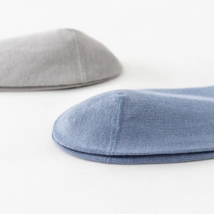 Men's cotton mid-calf socks in navy and grey showing seamless toe and fine knit texture