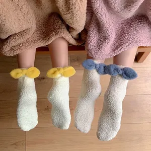 Thick coral fleece socks for women with cute bow details, ideal for winter warmth at home