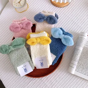 5-pack thick coral fleece thermal socks for women with cute bows in various pastel colors