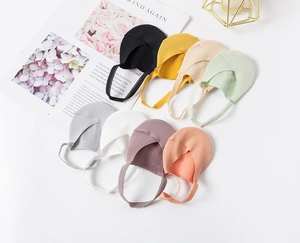 Flat lay of seamless ice silk invisible socks in eight vibrant colors with lace heel straps