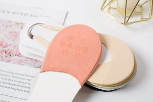 Close-up of non-slip floral silicone grip on colorful ice silk half-toe socks
