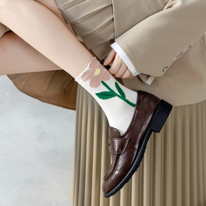 Casual cotton socks with 3D flower pattern paired with dark brown leather loafers shoes