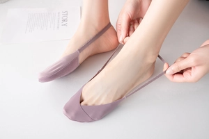 Close-up of light purple seamless ice silk no-show socks with elastic heel detail
