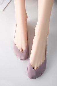 Macro detail of seamless light purple ice silk no-show socks for women with V-cut design