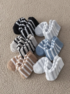Detailed set of six pairs of thick striped coral fleece socks for winter home wear