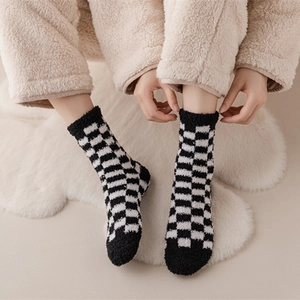 Fluffy black and white checkerboard coral fleece crew socks for winter home wear