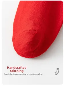 Detail of red cotton socks showing hand-sewn toe seams for a seamless fit and comfort