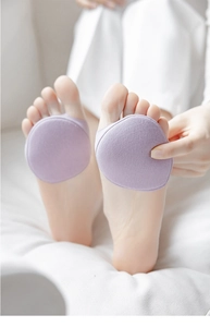 Detail view of breathable purple forefoot cushions providing pressure relief for women