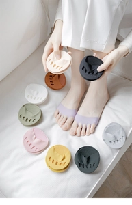 Detail view of colorful non-slip five-toe half socks for high heels and comfort