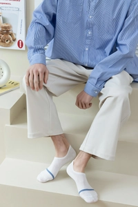 Close-up of white cotton low-cut socks for men with a stylish horizontal blue stripe detail
