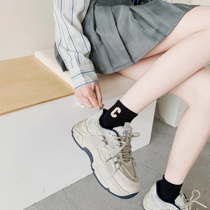 Retro cream white chunky sneakers with navy blue soles and leather mesh patchwork design