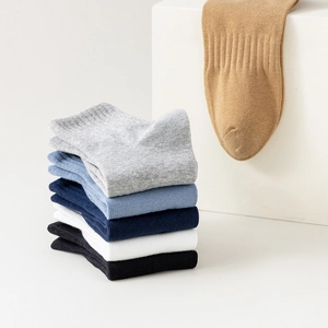 Breathable cotton crew socks in multi-color set with elastic ribbed cuffs and solid finish