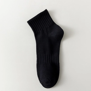 Men's solid black breathable cotton ankle socks with elastic ribbed cuffs and arch support