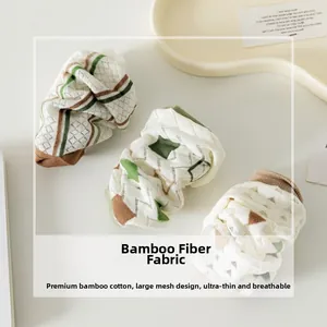 Detail of ultra-thin bamboo fiber mesh socks with breathable summer pattern