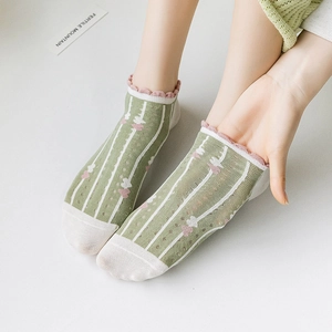 Women's bamboo fiber socks with pink heart pattern, light green stripes and ruffle trim
