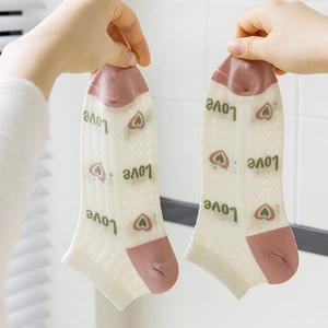 Women's bamboo fiber low-cut socks with pink heels and green 'Love' pattern in white