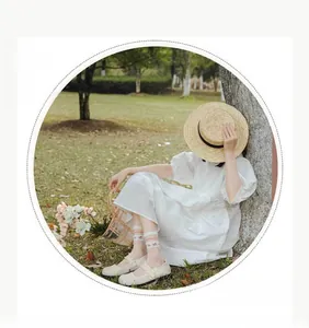 Detail of breathable summer mesh mid-calf socks paired with Mary Jane shoes and dress