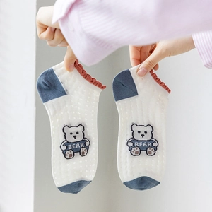Bamboo fiber white polka dot ankle socks with blue toe, red ruffle, and bear embroidery