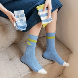 Detail showing high-quality cotton blend texture and Start Studio embroidery on crew socks