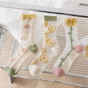 Sheer glass silk socks with tulip and daisy embroidery in light yellow and green mesh