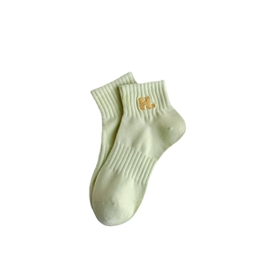 Mint green cotton sport socks for women with embroidered H letter and ribbed cuffs