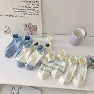 Women's blue cotton boat socks with animal embroidery and floral patterns in 4-pair set