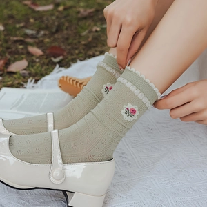 Sweet light green mid-calf socks with pink flower embroidery and white lace trim