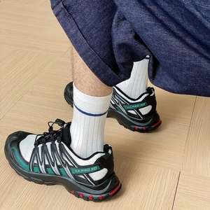 On-foot view of XA PRO 3D outdoor trail shoes with breathable mesh and quick lace system