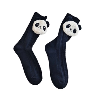 Cute black crew socks with 3D plush panda dolls for women and children on white background