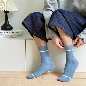 Morandi blue crew socks with white stripes and ribbed cuffs for modern men's casual wear