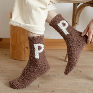 Thick coral fleece mid-calf socks with letter P embroidery on a warm brown fabric
