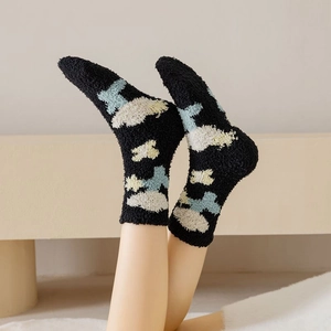 Detail of soft coral fleece tulip winter socks showing thick warm textured plush fabric