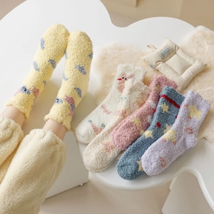 Detailed set of five thick coral fleece socks with cartoon bear and star patterns