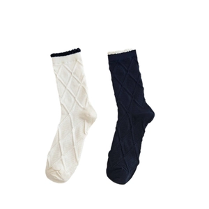 Lace-trimmed floral mid-calf socks with textured diamond knit pattern in cream and navy