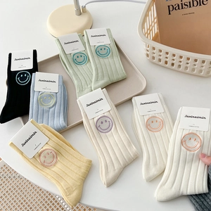 Combed cotton crew socks set featuring colorful smile embroidery and ribbed texture