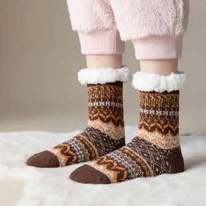 Thick sherpa lined winter socks with Nordic knit pattern and anti-slip silicone soles