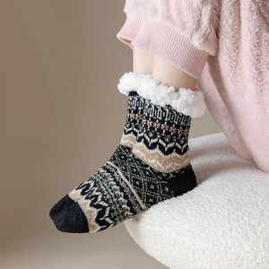 Detailed view of fleece lining and Nordic geometric pattern on thick thermal socks