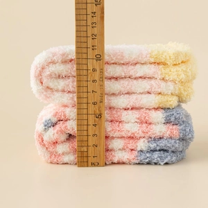 Thick coral fleece tulip socks with striped texture and 11cm stack height detail