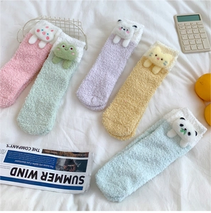 Five pairs of coral fleece socks with 3D animal ears in pastel pink, green, and blue