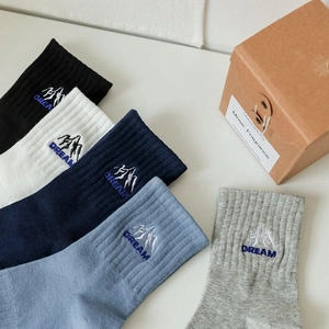 Mid-calf cotton socks in five colors with mountain embroidery and ribbed cuffs