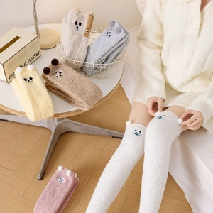 Thigh-high coral fleece winter socks with cute animal ears and soft plush texture