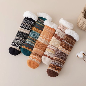 Thick sherpa lined thermal cabin socks with anti-slip silicone and vintage knit patterns