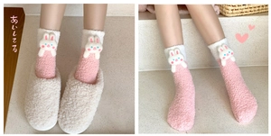 Detail of coral fleece winter socks with cute plush bunny decor and soft pink texture