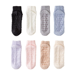 Eight pairs of colorful non-slip coral fleece socks for women in pastel macaron colors