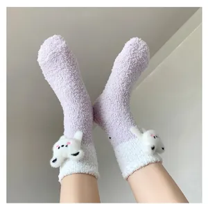 Detail of plush lavender coral fleece socks with cute 3D white bear accessory decoration